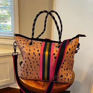 Haute Shore convertible design neoprene tote purse.